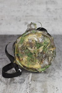 Apocalyptic canteen with a dragonfly